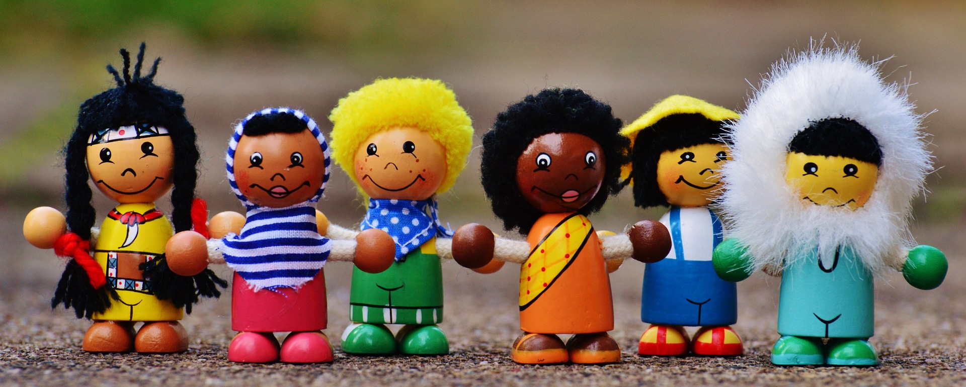 Different nationalities little play figures